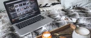open computer on the sofa. photo